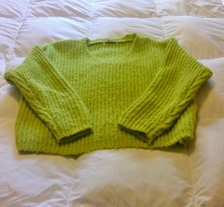 Dos jerséis de punto verde y turquesa