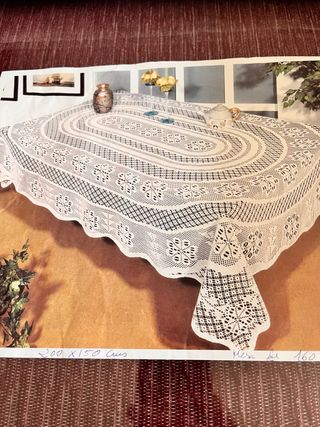 Mantel ganchillo industrial blanco.