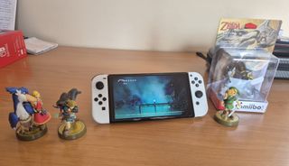 Nintendo Switch OLED + 4 Amiibos + Mando NYXI