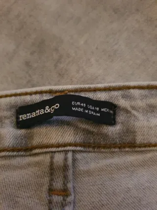 Pantalón vaquero ancho desgastado