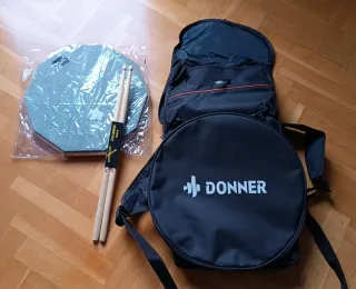 Pad de batería + funda + baquetas