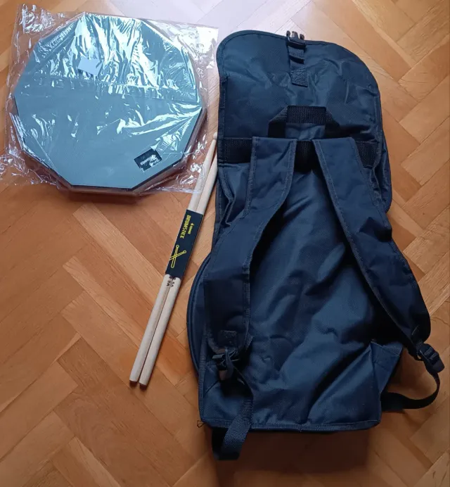 Pad de batería + funda + baquetas