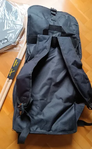 Pad de batería + funda + baquetas