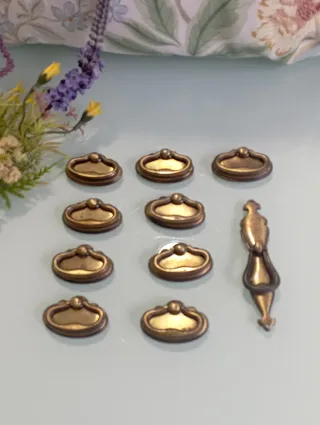 12 tiradores de cajón dorados