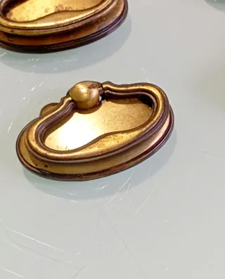 12 tiradores de cajón dorados