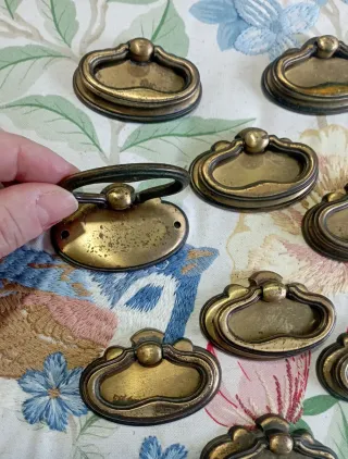 12 tiradores de cajón dorados