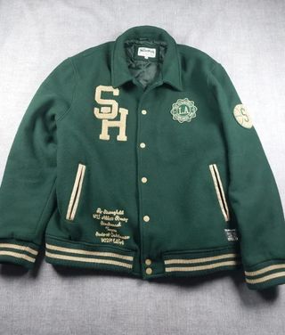 Chaqueta Varsity The Stronghold Verde y Crema