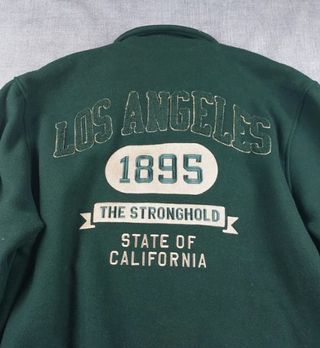 Chaqueta Varsity The Stronghold Verde y Crema