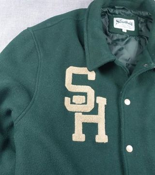 Chaqueta Varsity The Stronghold Verde y Crema