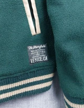Chaqueta Varsity The Stronghold Verde y Crema
