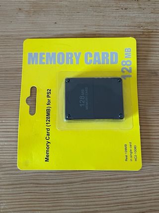 PS2 Slim Negra + T memoria + mando y cables.