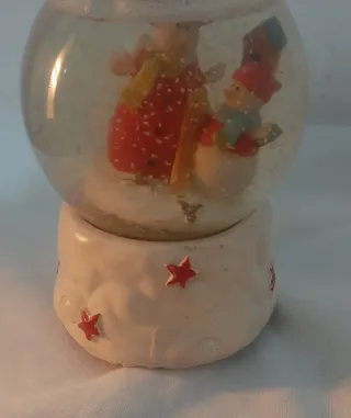 Bola de nieve musical con muñecos