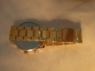 Reloj DIJANEs azul y dorado