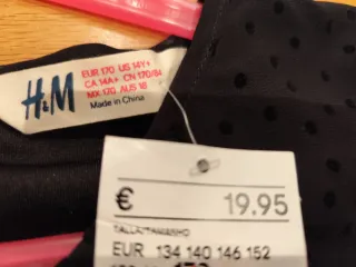 Blusa H&M negra con lunares y goma en cintura