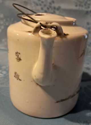 Antica teiera cinese decorata