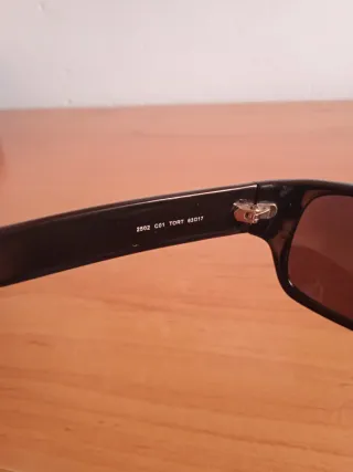 Gafas de sol Lacoste negras con lentes negras