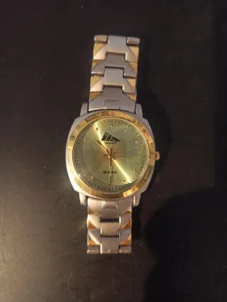 Reloj Decadas Caballero Dorado y Plateado