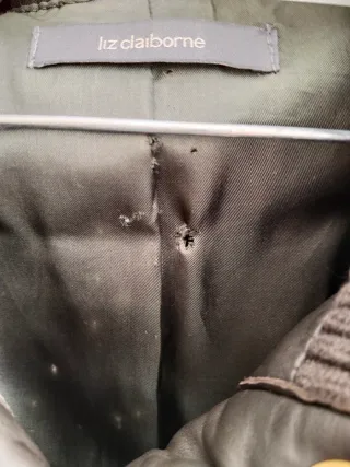 Chaqueta de piel mujer verde oscuro.