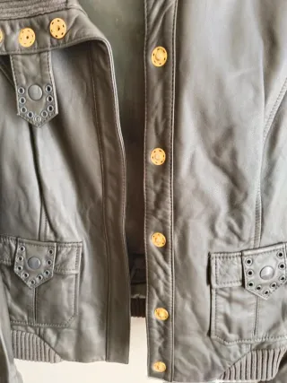 Chaqueta de piel mujer verde oscuro.