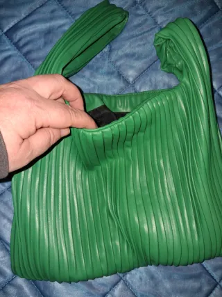 Bolso de mano verde para eventos