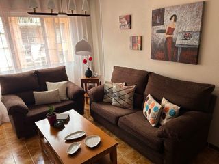 Conjunto de sofás de tela marrón