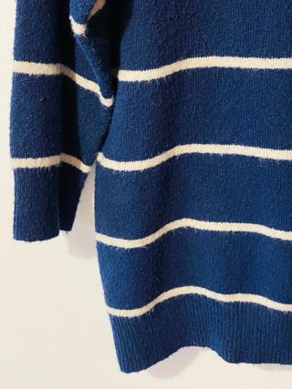 Jersey oversize de cuello alto a rayas