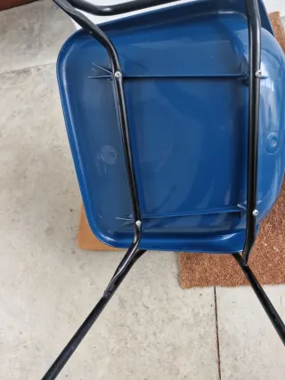 Silla con pupitre de Robin Day.