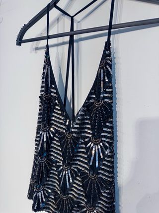 Top pedrería negro y plateado