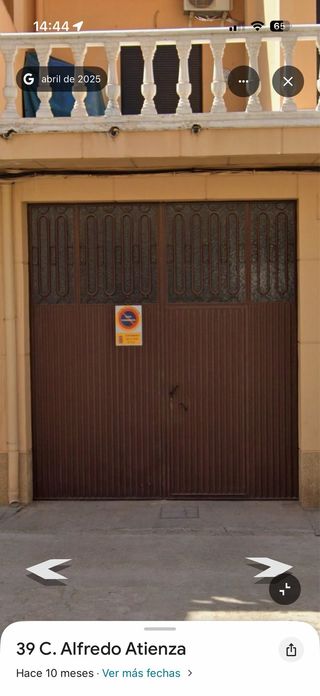 Puerta metálica 3,10x3,40 con postigo