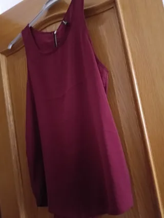 Blusa Stradivarius sin mangas con cremallera