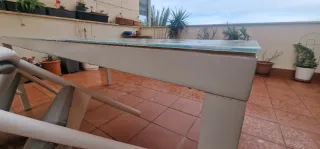 Mesa de exterior cristal y aluminio 1,80×1,00metro