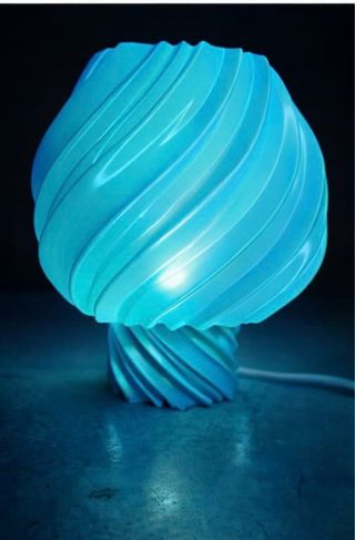 Lámpara de mesa moderna espiral