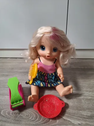 Muñeca Baby Alive con accesorios