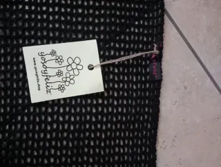 Mantella nera con frange