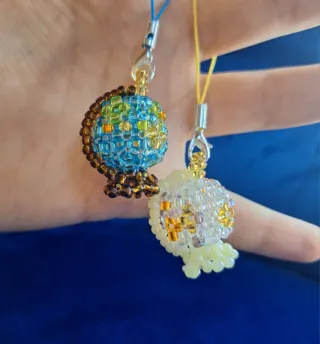 Portachiavi perline mappamondo chiaro