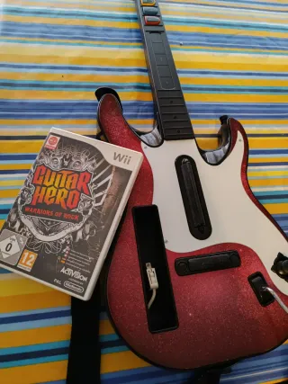 Juego wii guitar hero + regalo guitarra