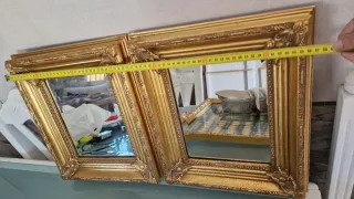 Specchi dorati con cornice intagliata