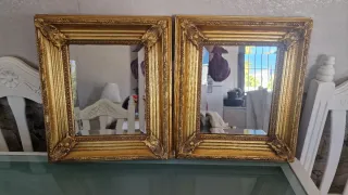 Specchi dorati con cornice intagliata