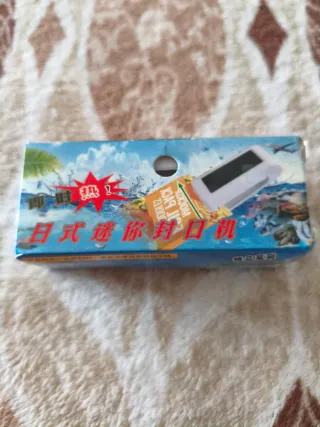 Mini selladora de bolsas estilo japonés