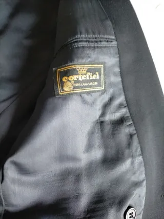 Americana hombre azul marino