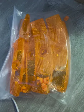 10 Reflectores Naranja para Ruedas de Bicicleta.