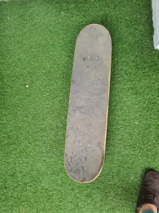 Monopatín Oxelo Skateboard Diseño Calaveras