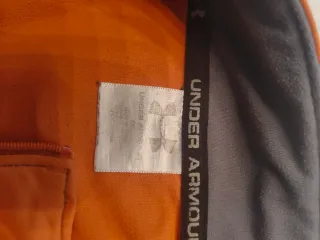 Jersey térmico Under Armour gris y naranja