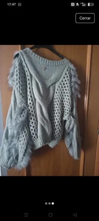 Jersey pelo gris talla s/m.