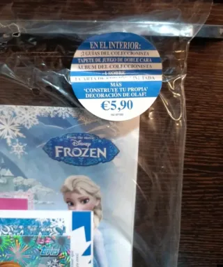 25 sobres cromos Frozen Disney + archivador + lata