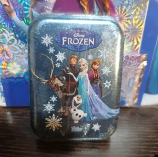 25 sobres cromos Frozen Disney + archivador + lata