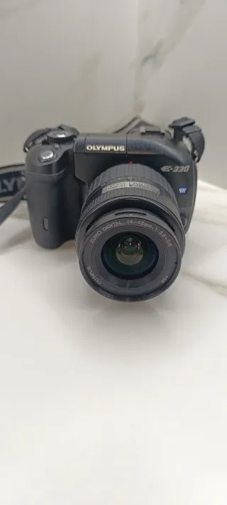 Olympus E-330 + Lentes + Flash Metz