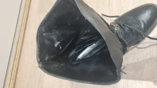 Botas negras con cordones y cremallera