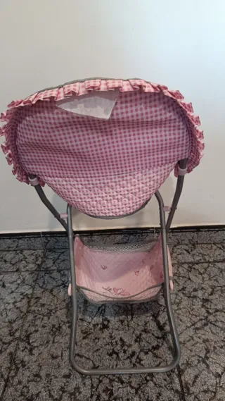 Trona de juguete rosa con estampado