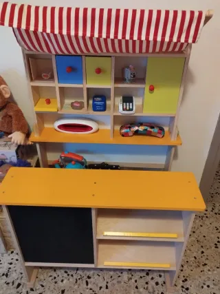 Supermercado de juguete con carrito